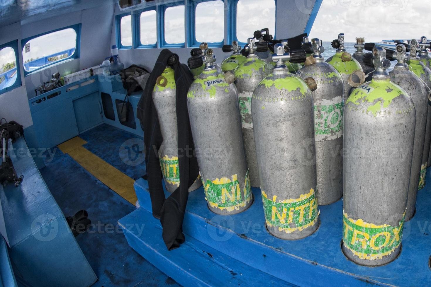 Tank on scuba diving boat photo