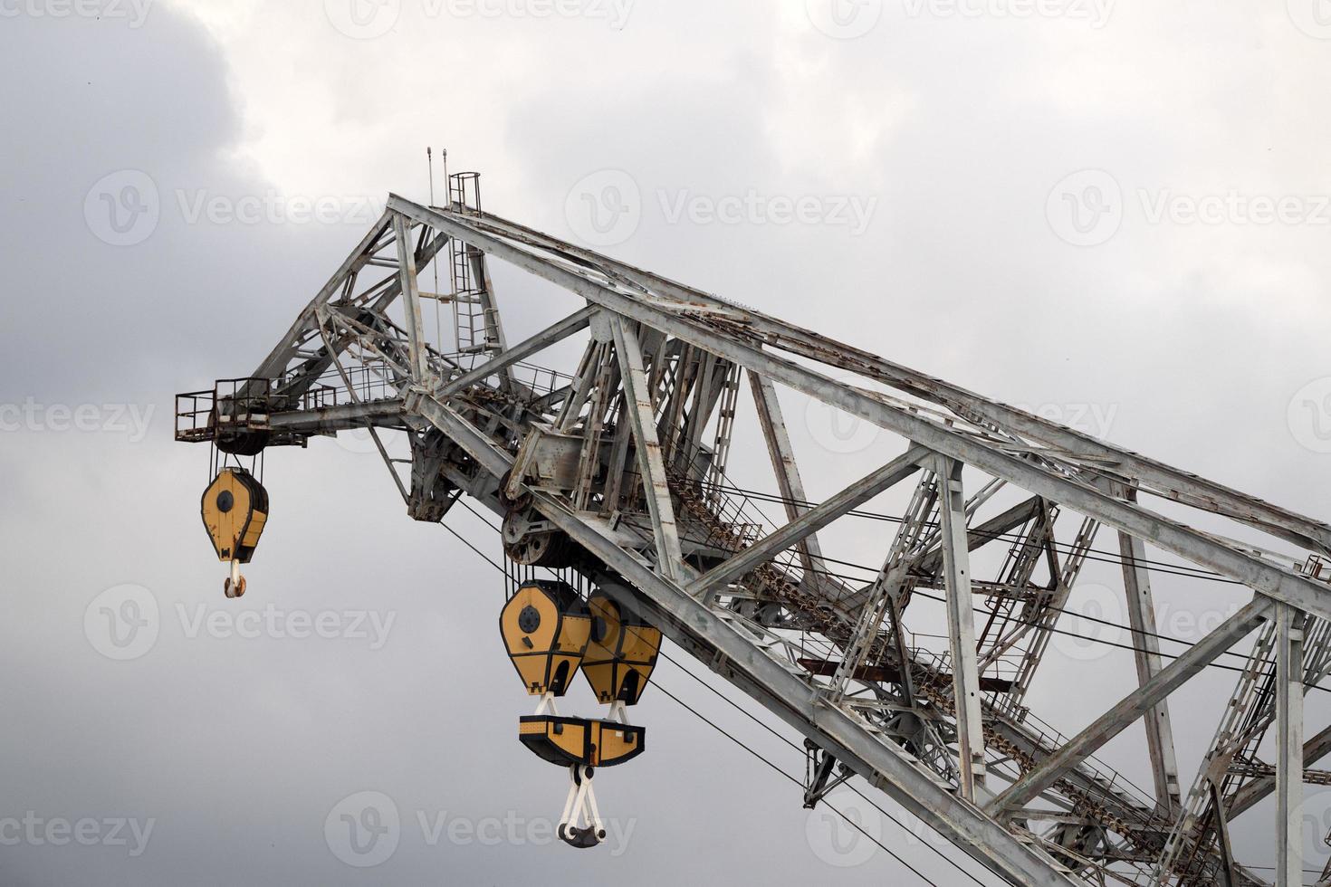 old harbor iron crane detail photo