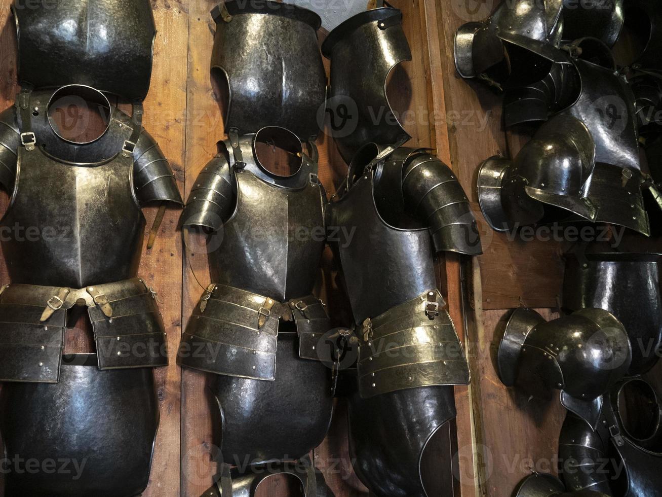 many medieval iron metal armor photo