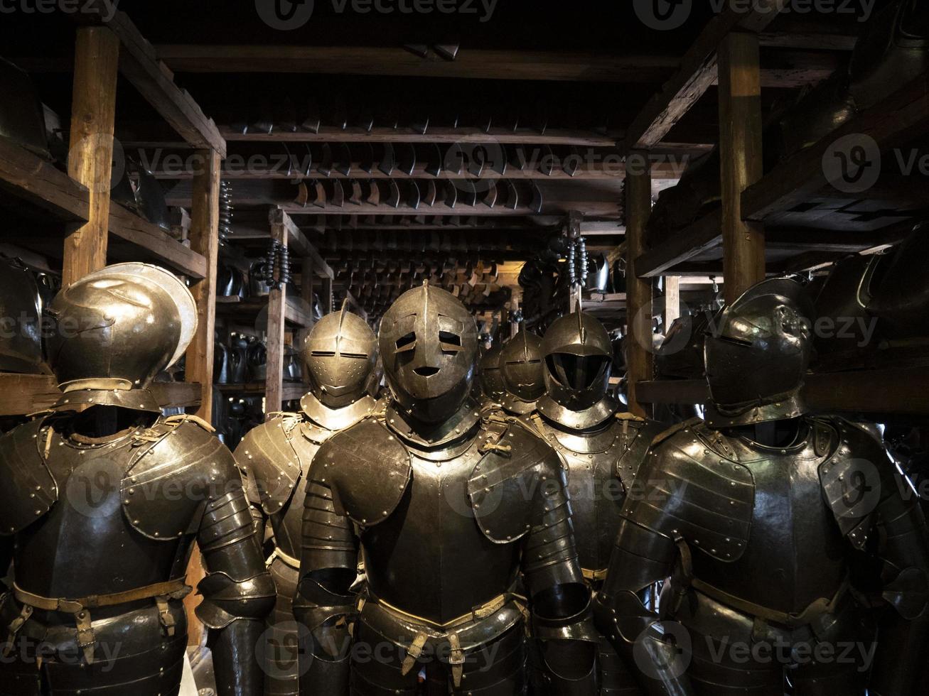 many medieval iron metal helm armor photo