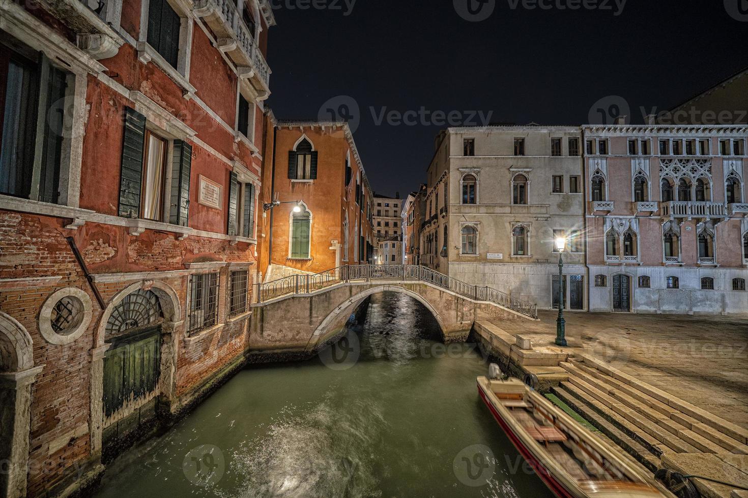 Venice Gondola tour at night photo