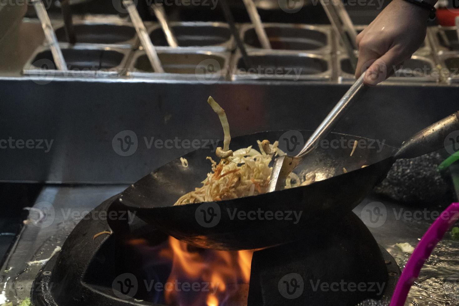 wok rice spaghetti cooking photo