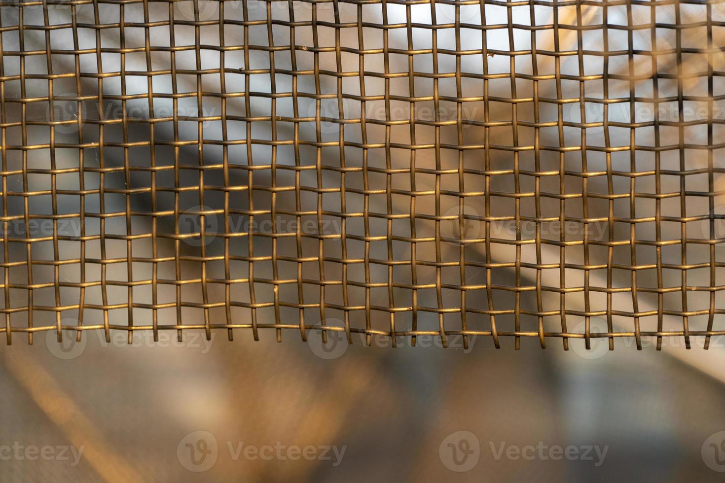 fondo de rejilla metálica dorada foto