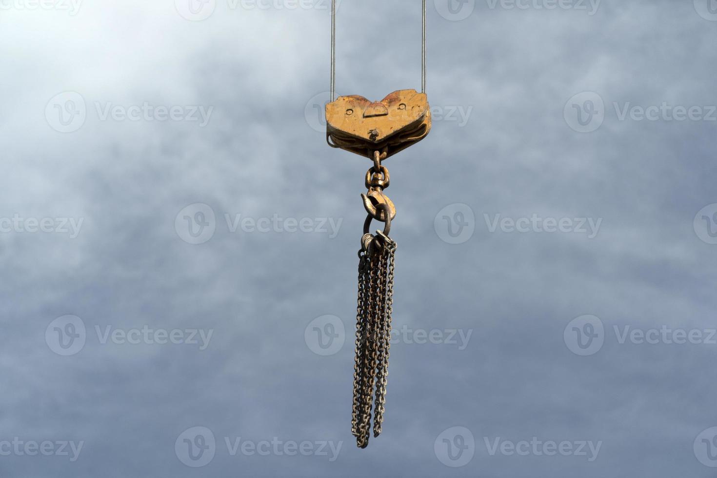 crane chain detail in sky background photo