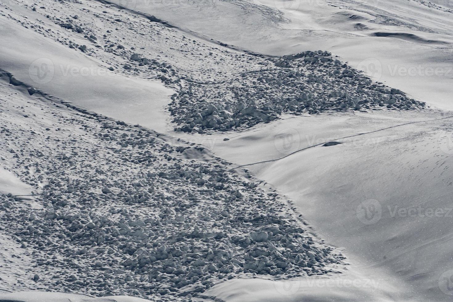 Avalanche snow slide in dolomites mountains photo