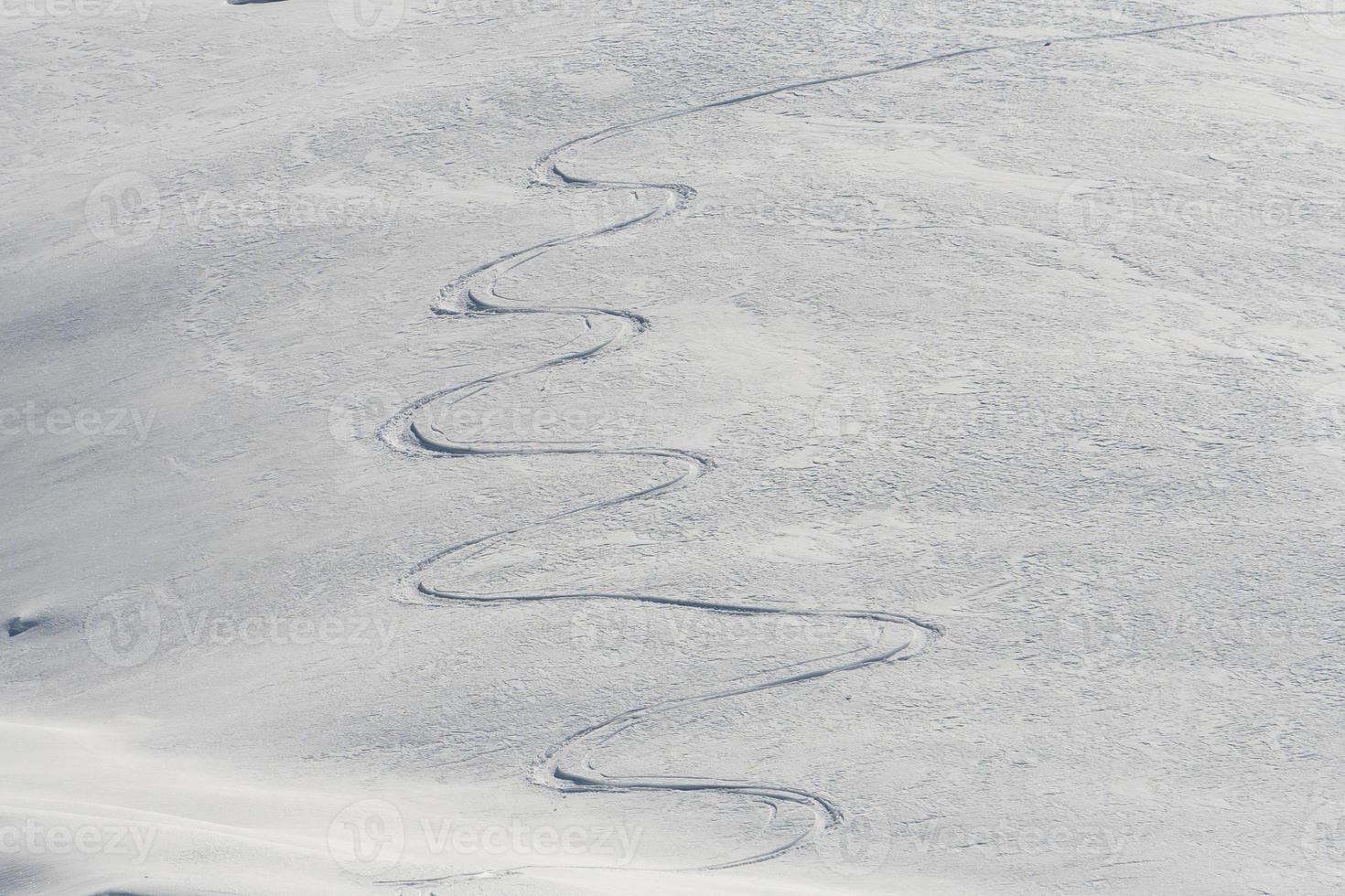 backcountry skiing trails snow detail photo