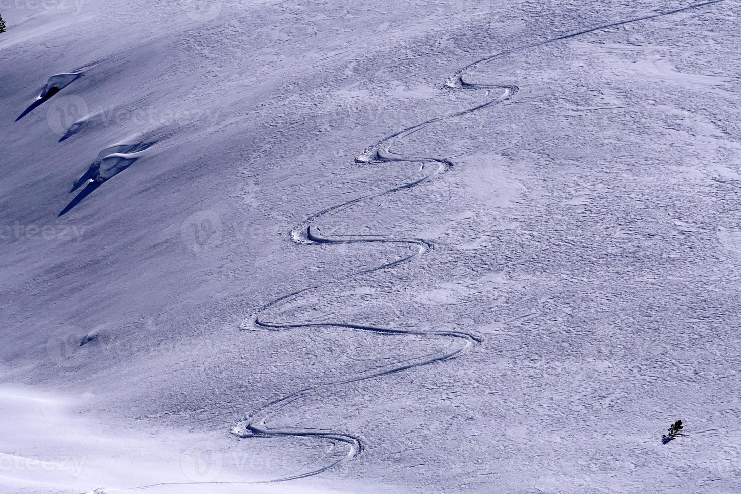 backcountry skiing trails snow detail photo