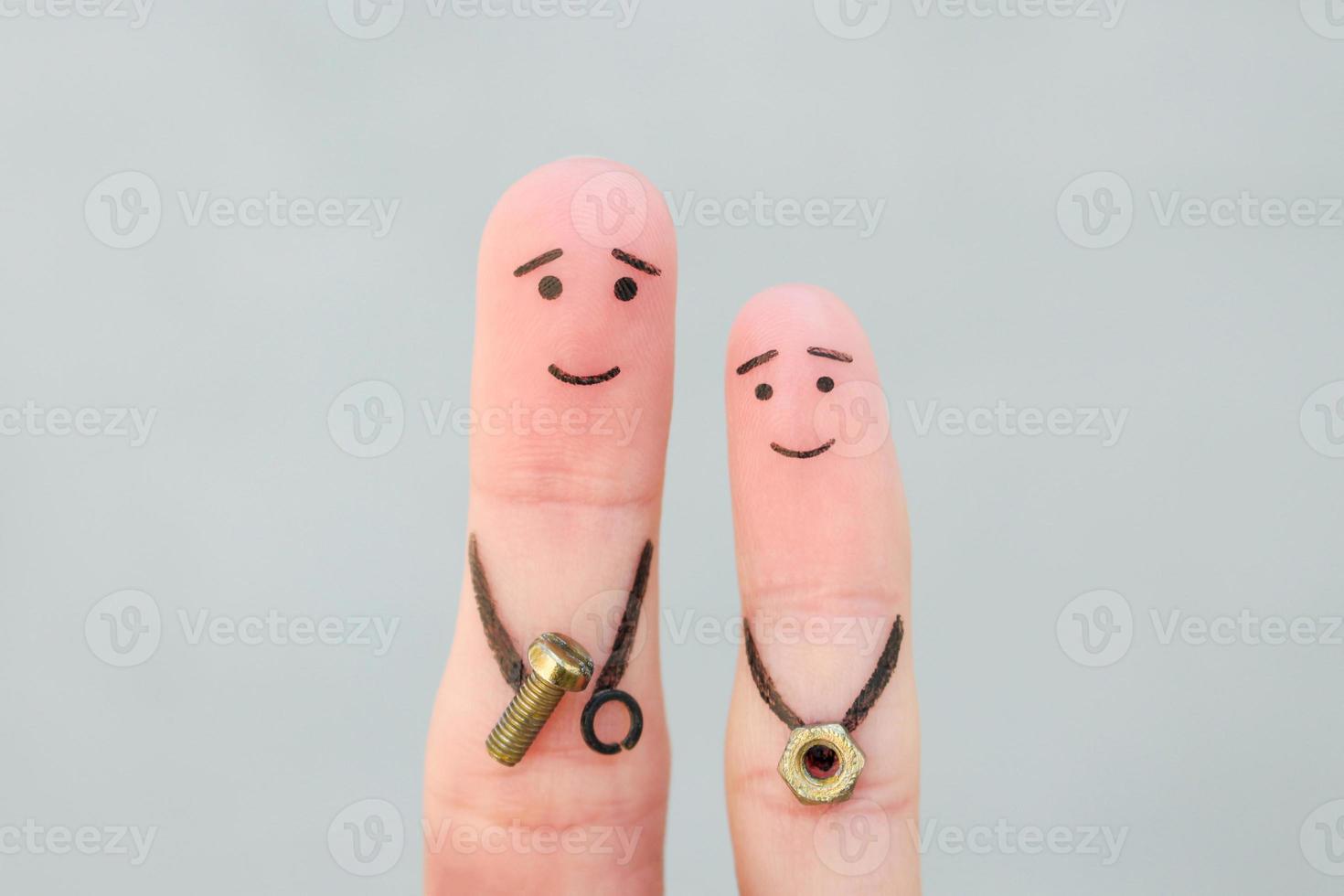 Fingers art of happy family. Concept father teaches son to repair. photo