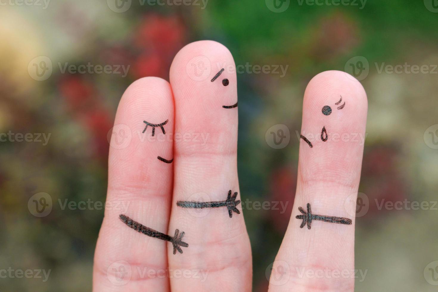 Fingers art of happy couple. A man loves another woman. The concept of unrequited love. photo