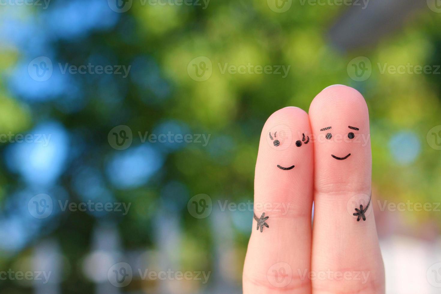 Fingers art of happy family.  The concept of a walk in the summer park. photo