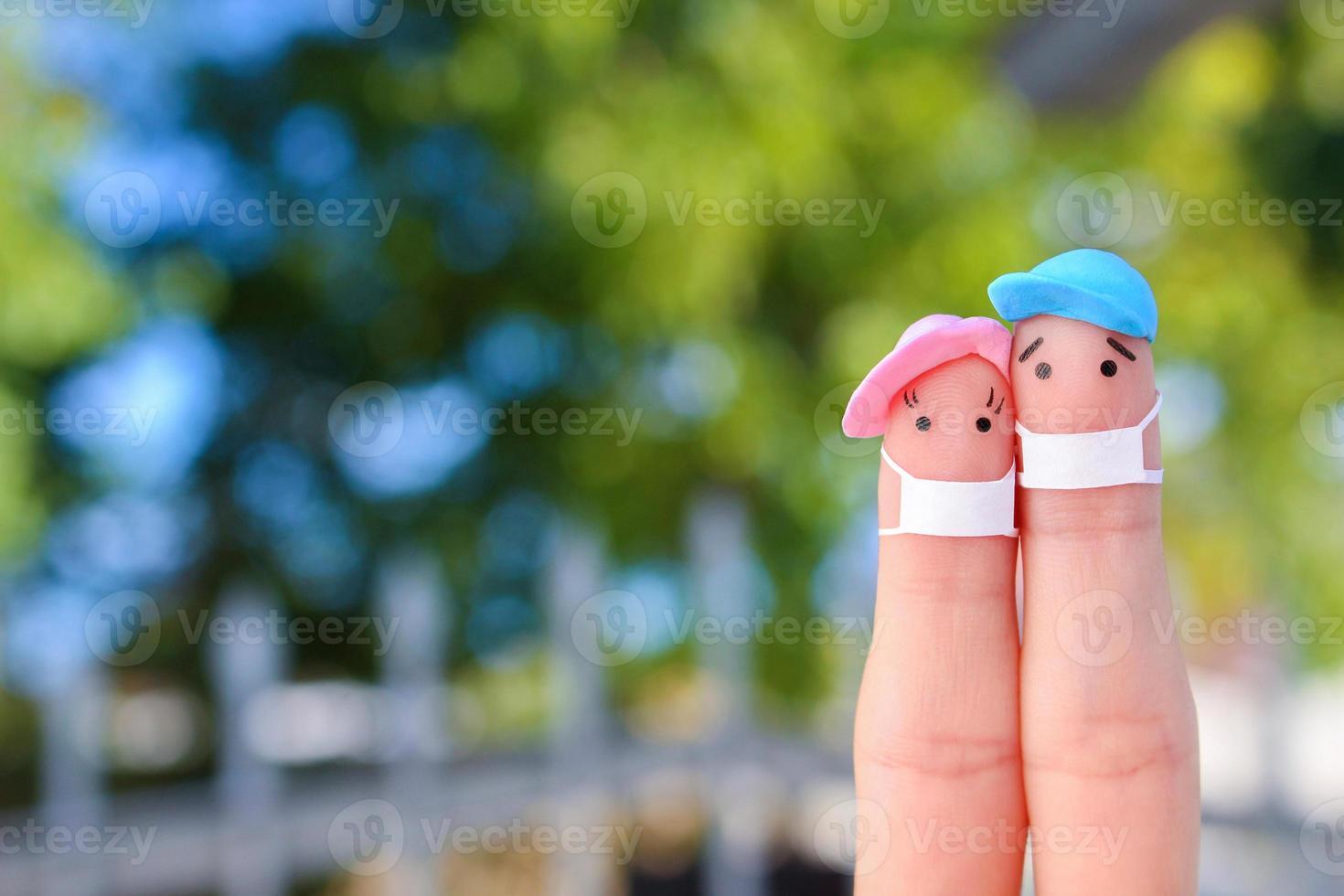 Fingers art of couple with face mask. Space for text. photo