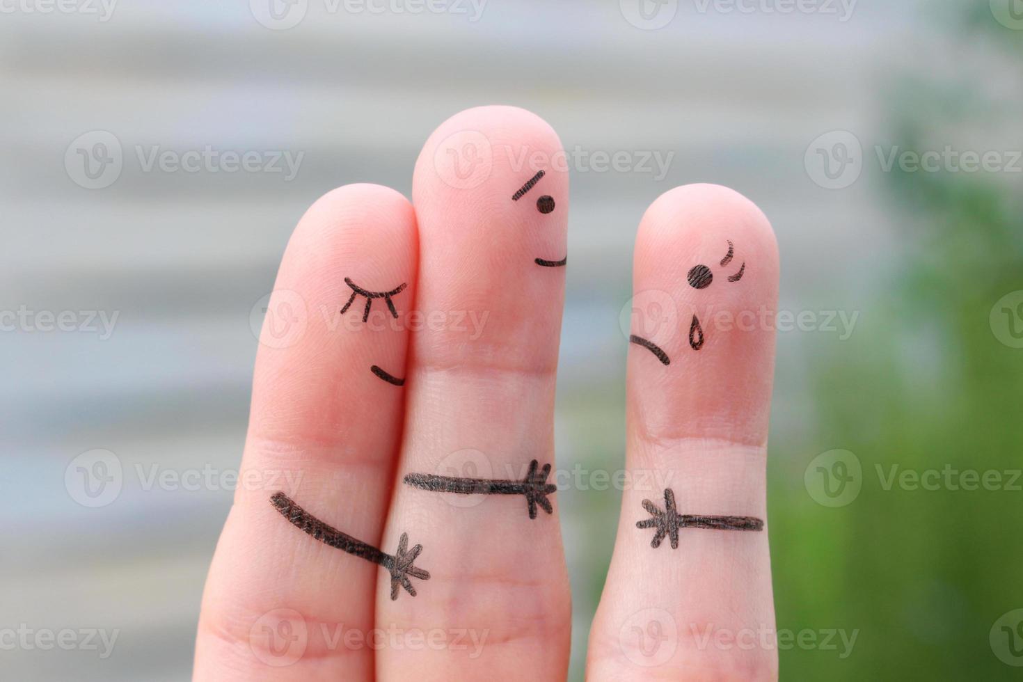 Fingers art of happy couple. A man loves another woman. The concept of unrequited love. photo