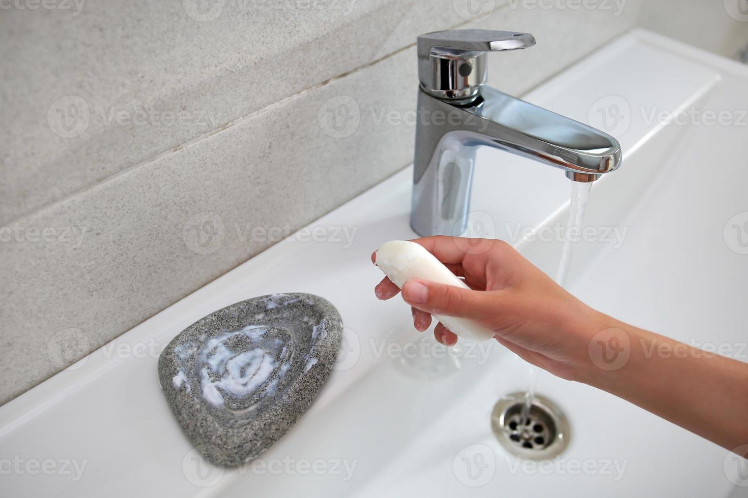 The wet soap has gone sour in the soap dish. photo