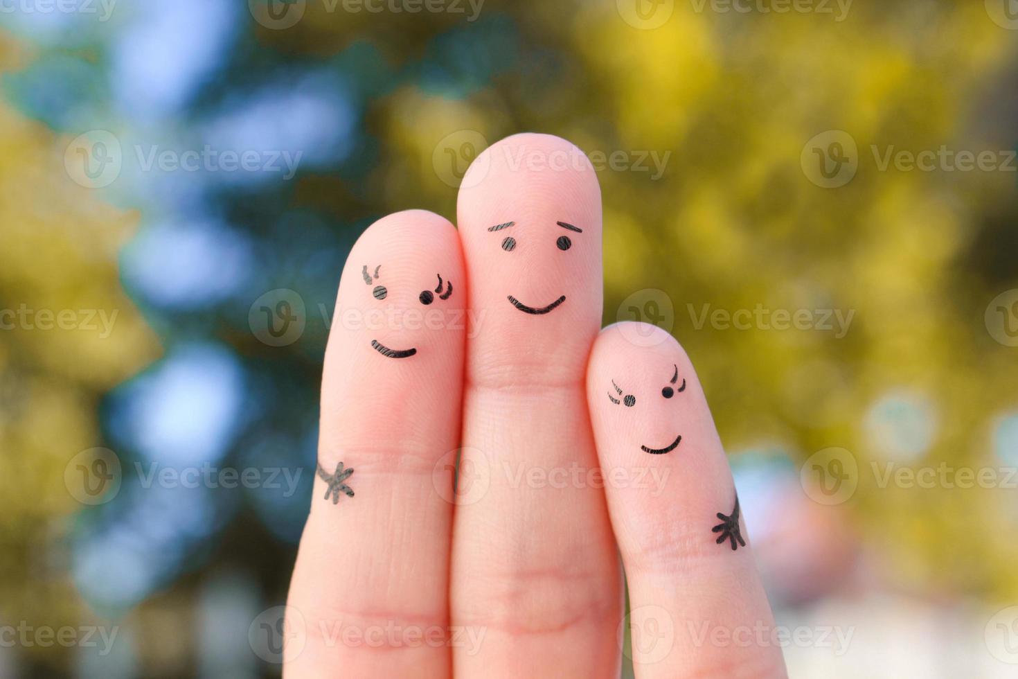 Fingers art of happy family.  The concept of a walk in the autumn park. photo