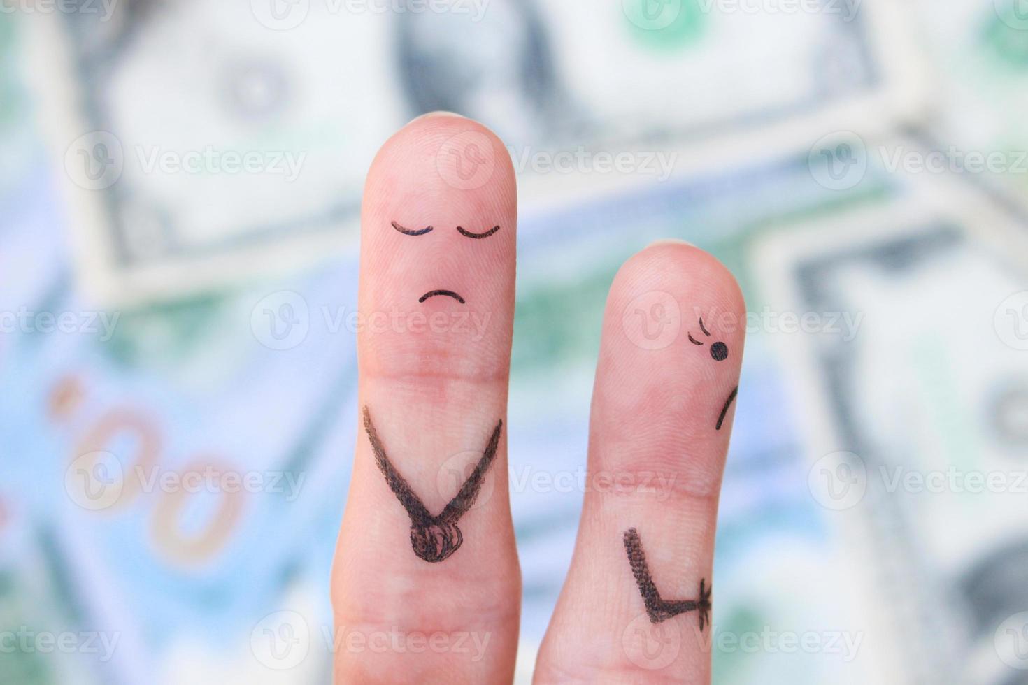 Fingers art of a woman leaves a man because he earns little. photo