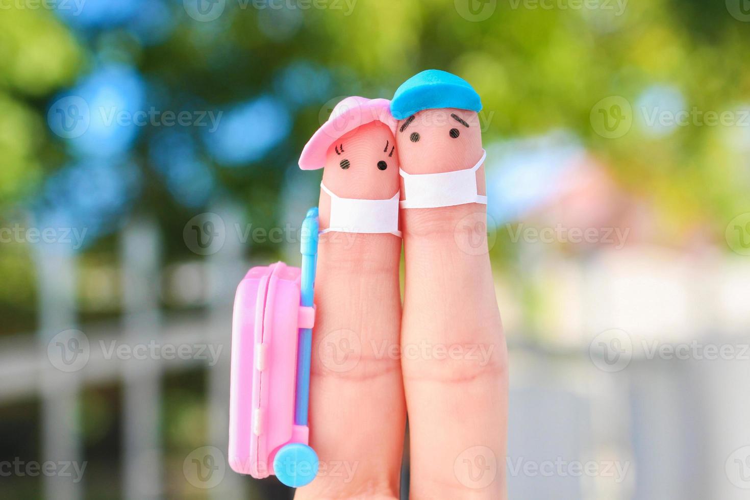Fingers art of happy couple. Man and woman going on vacation. photo