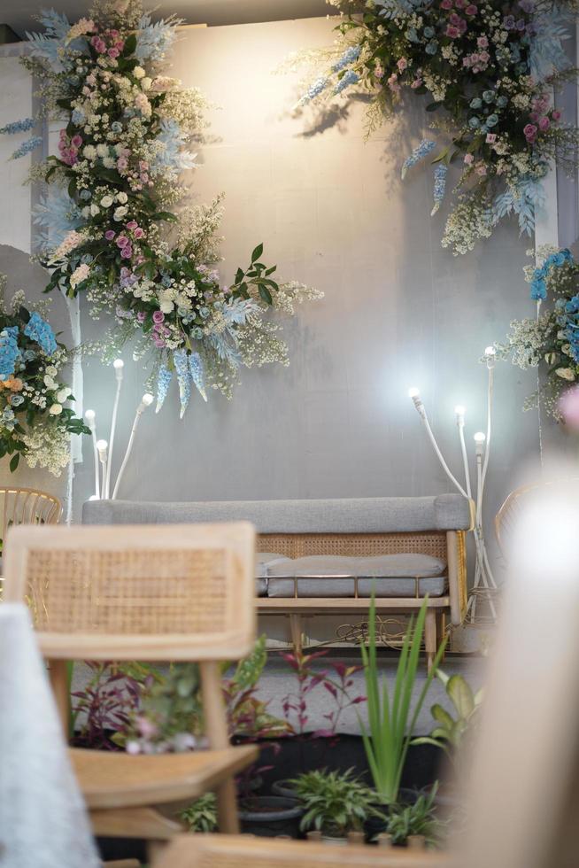 Beautiful Wedding Decoration with Flowers, Leaves and Lamps photo