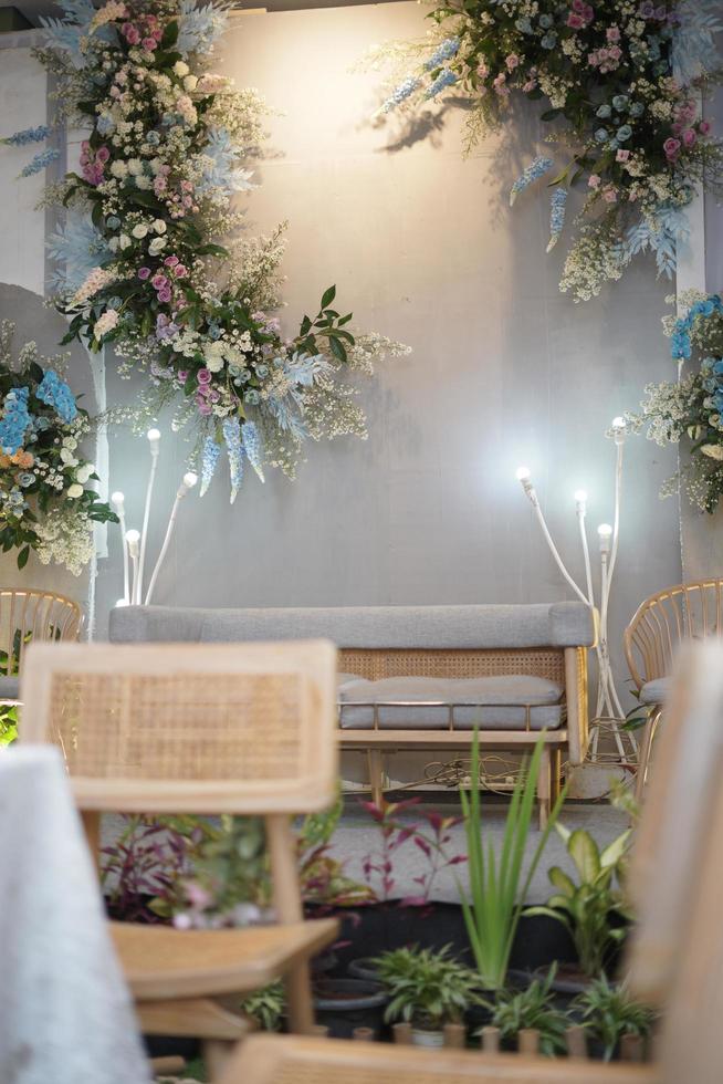 Beautiful Wedding Decoration with Flowers, Leaves and Lamps photo
