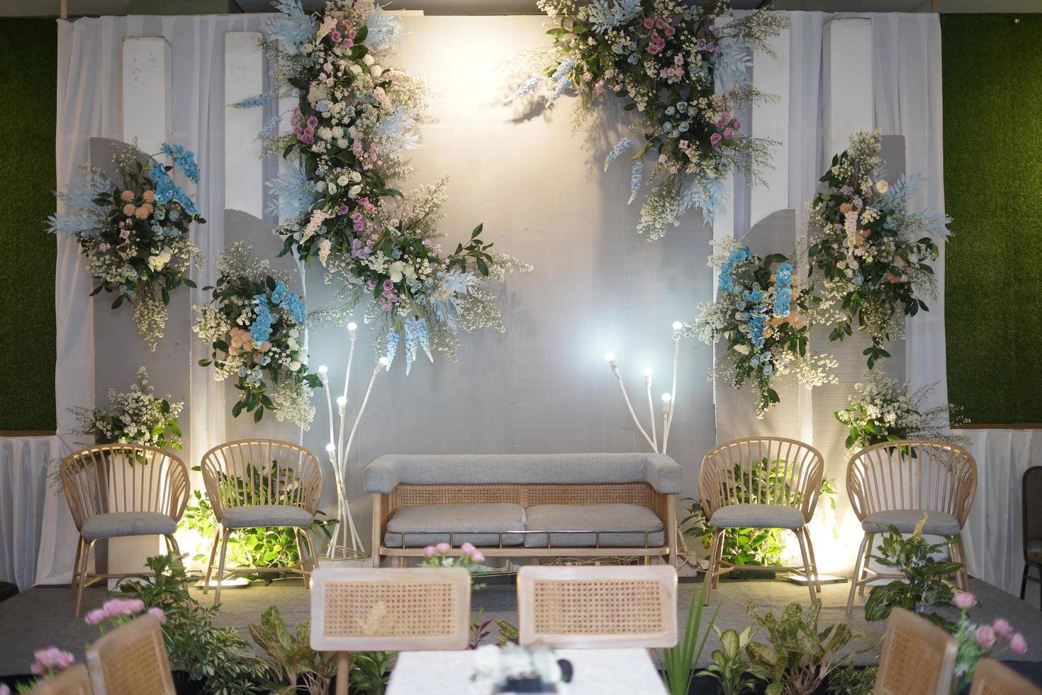 Beautiful Wedding Decoration with Flowers, Leaves and Lamps photo