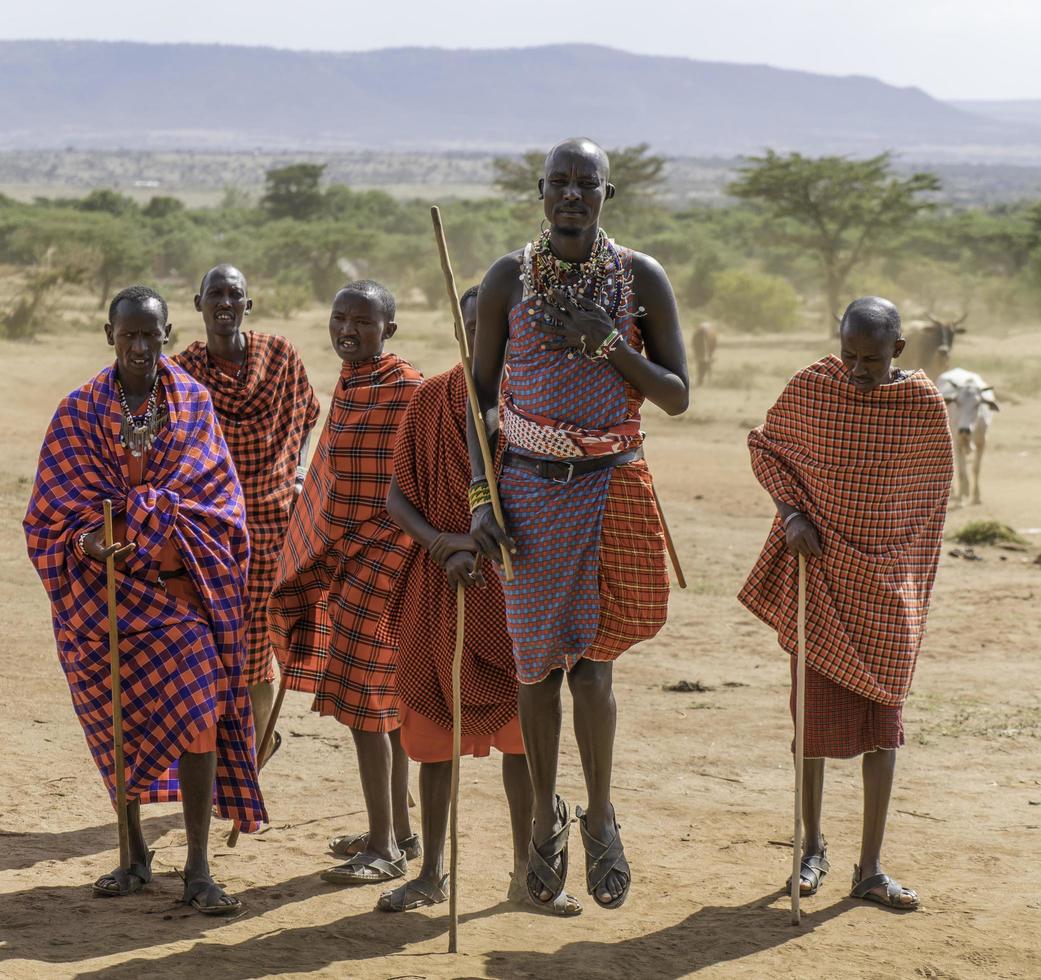 December 17 2017.  Masai Mara National Park, Kenya, Africa. Tribe members of the Masai Mara participate in a traditional dance. photo