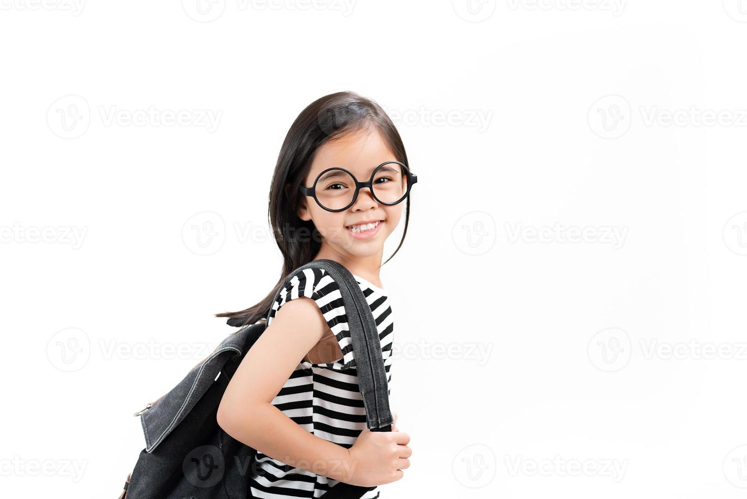 little child girl carry backpack photo