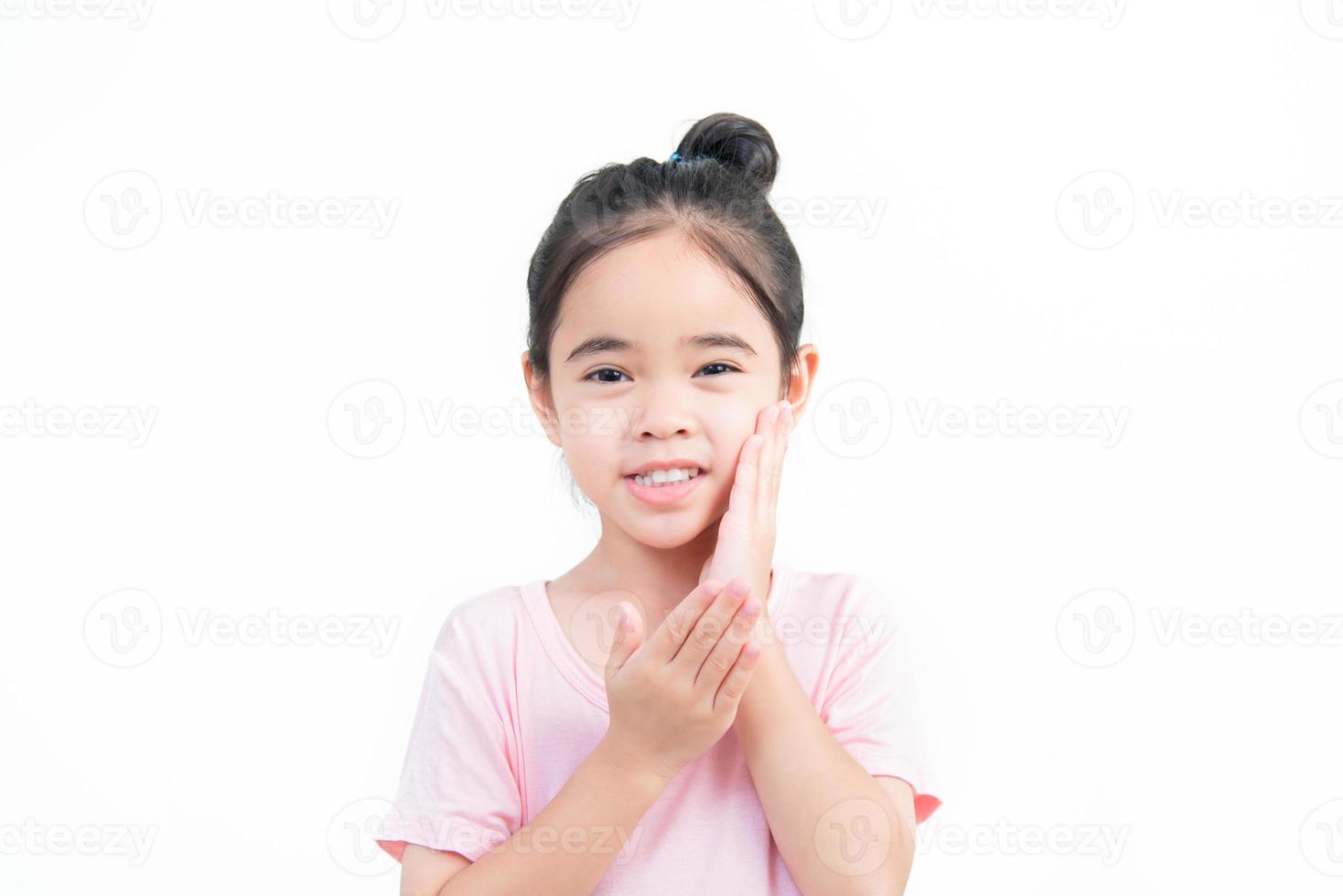 child girl Asia face skin care photo