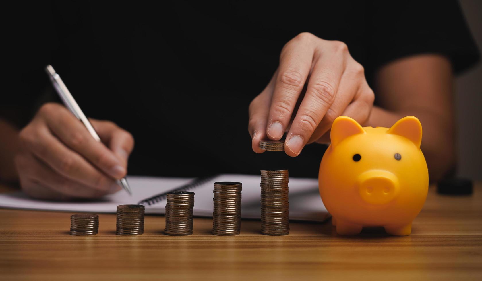 money save concept, businessman keeping money in a piggy bank. financial planning, save money for the future, Savings and pensions,  finance, investment, Financial planning. photo