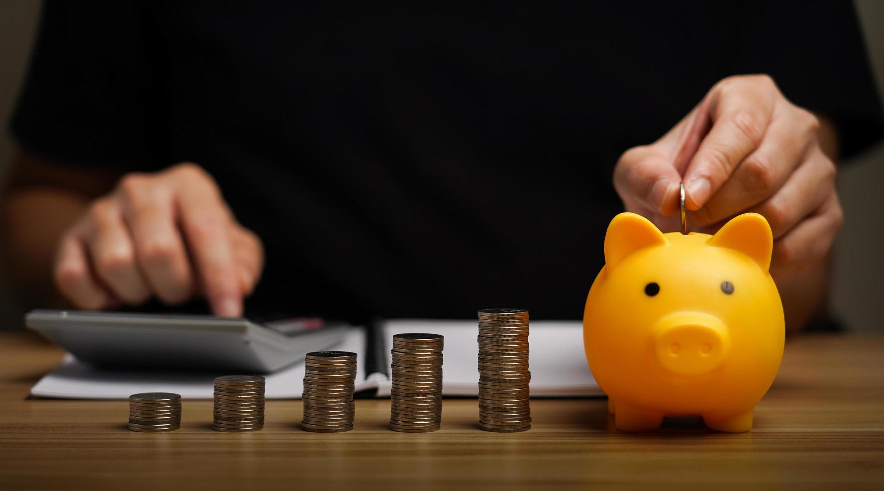 money save concept, businessman keeping money in a piggy bank. financial planning, save money for the future, Savings and pensions,  finance, investment, Financial planning. photo