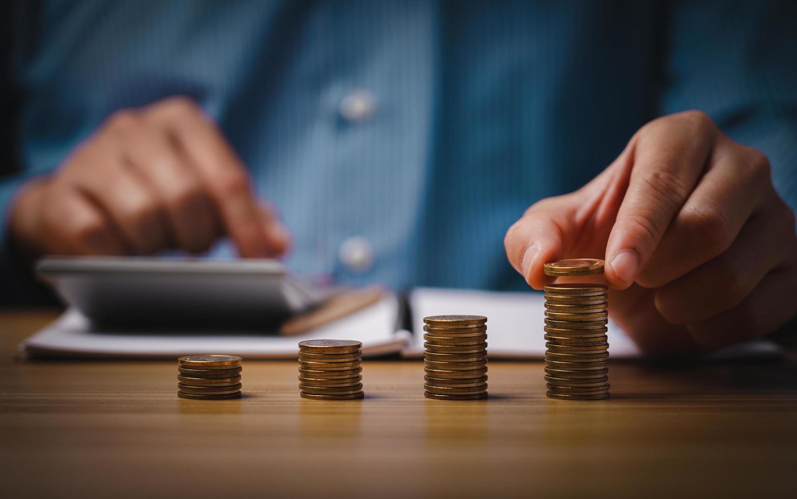 interest rate and dividend concept, businessman calculating income and return on investment. income, return, retirement, compensation fund, investment,dividend tax,stock market, trend,strategy photo