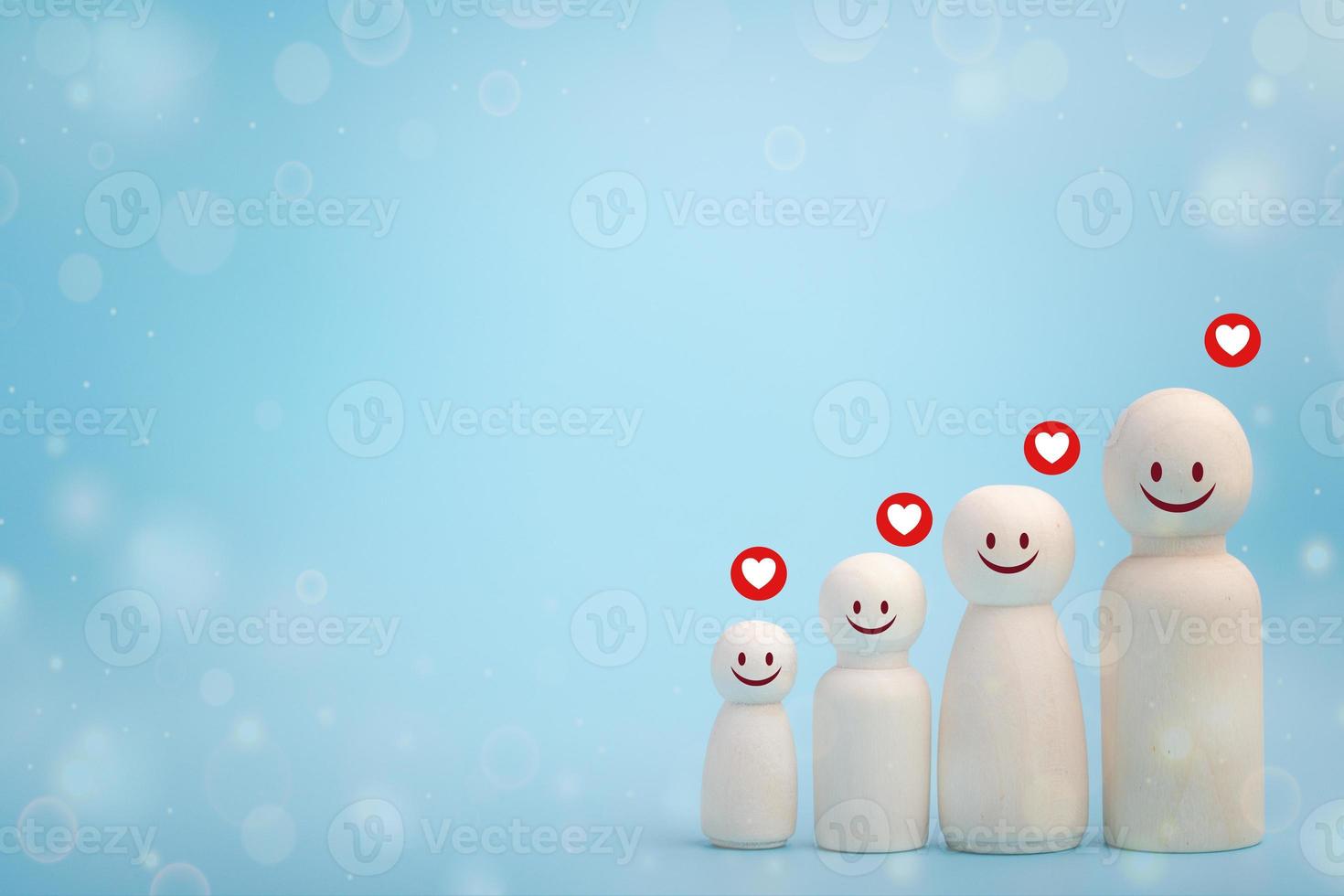 wooden figures of family members, a symbol of good family relationships photo