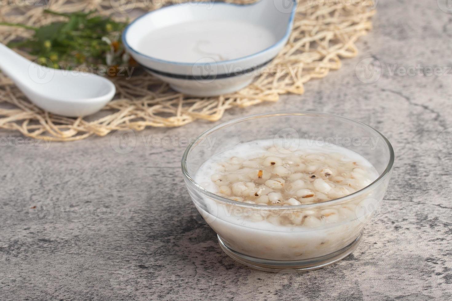 Job's tear in coconut milk in a glass cup photo