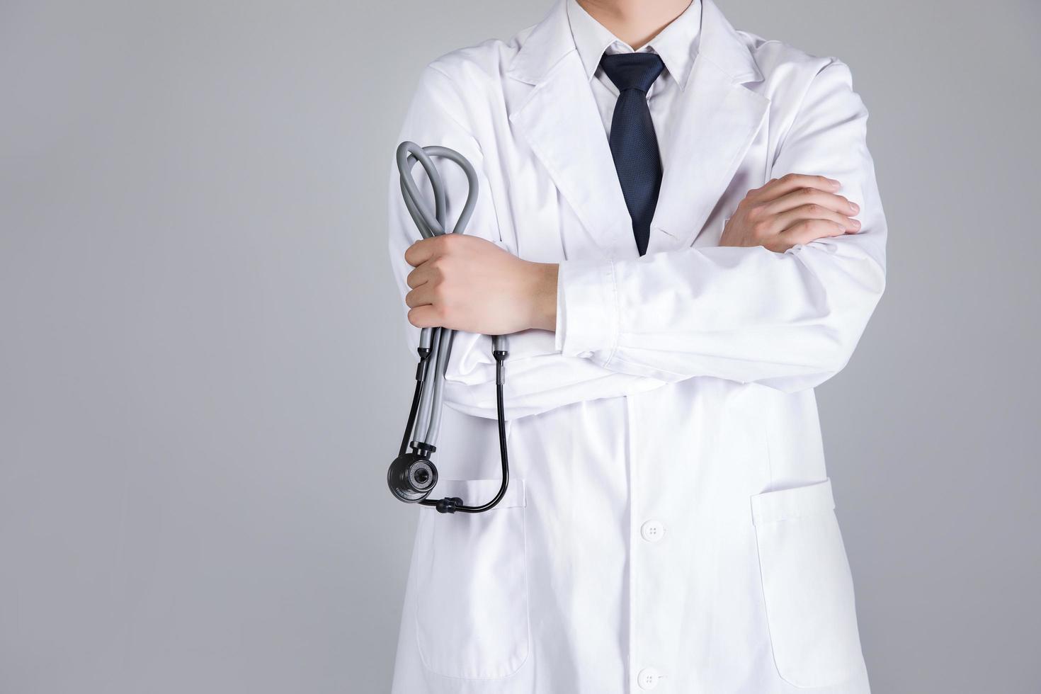 doctor holding stethoscope in hand photo