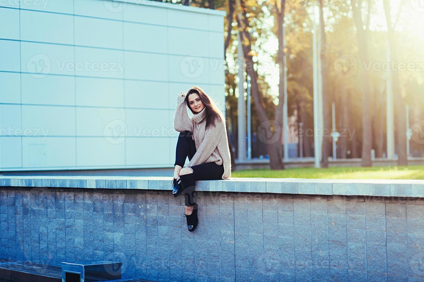 Smiling cheerful long-haired girl photo