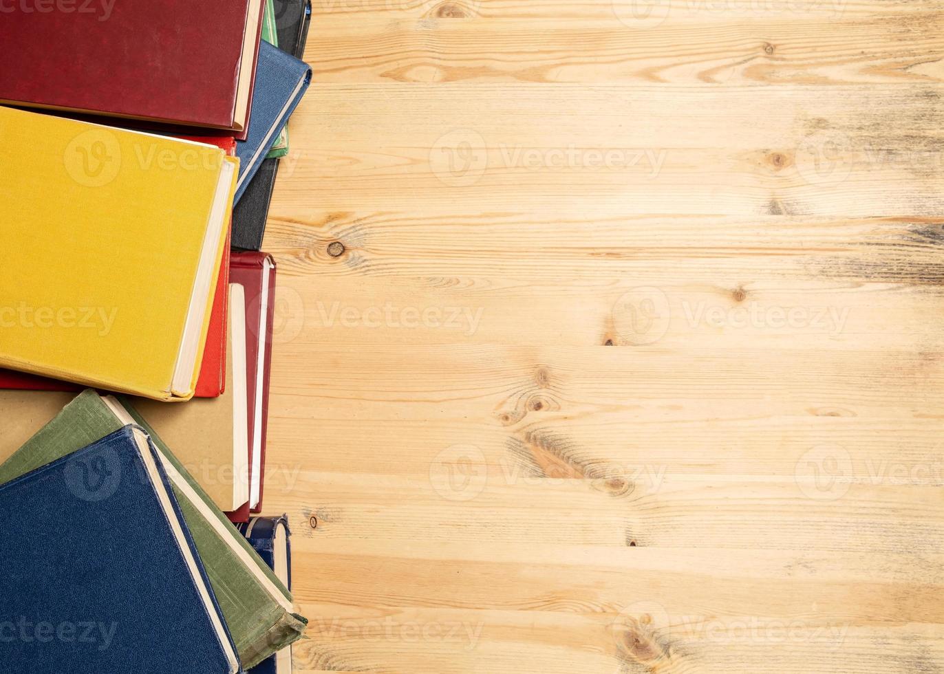 Various books on a wooden table. Flatley. Education concept. Copy space. photo