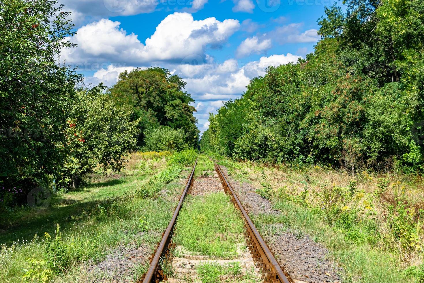 Photography to theme railway track after passing train on railroad photo