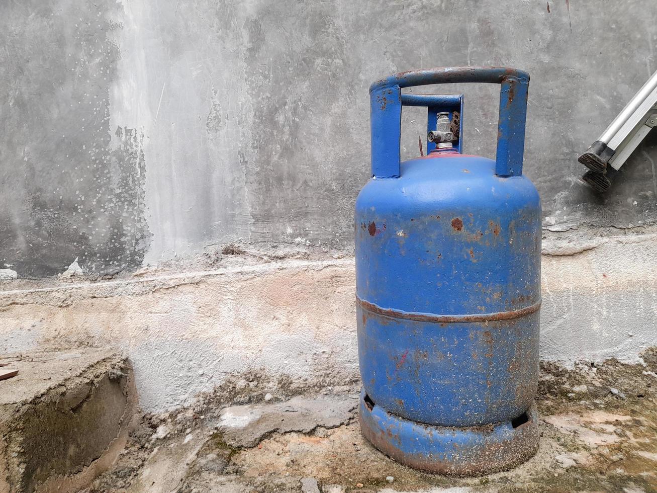 Blue LPG cylinder that is not in use photo