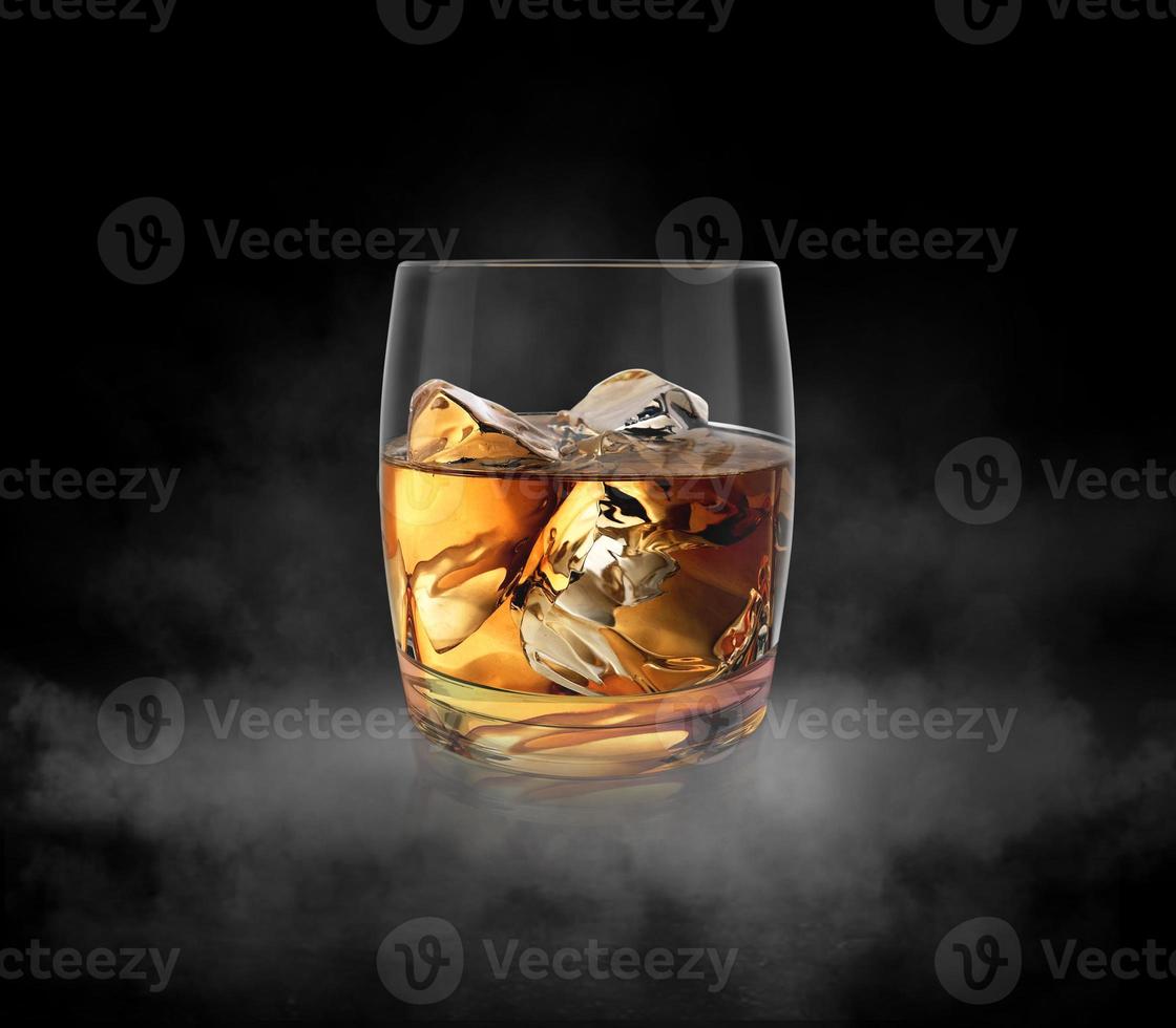 Glass of whiskey nestled on dark background with cold vapor an dark studio background. 3d render photo