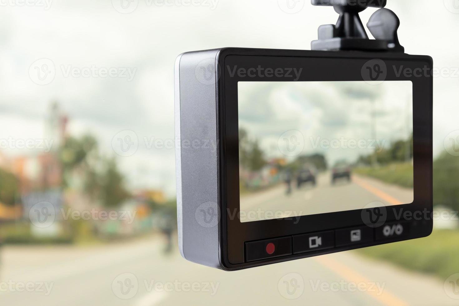 Car CCTV camera video recorder for driving safety on the road photo