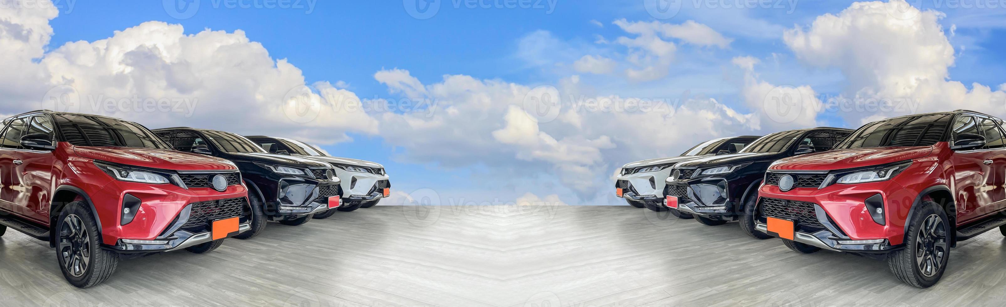 Lot of used car for sales in stock with sky and clouds photo