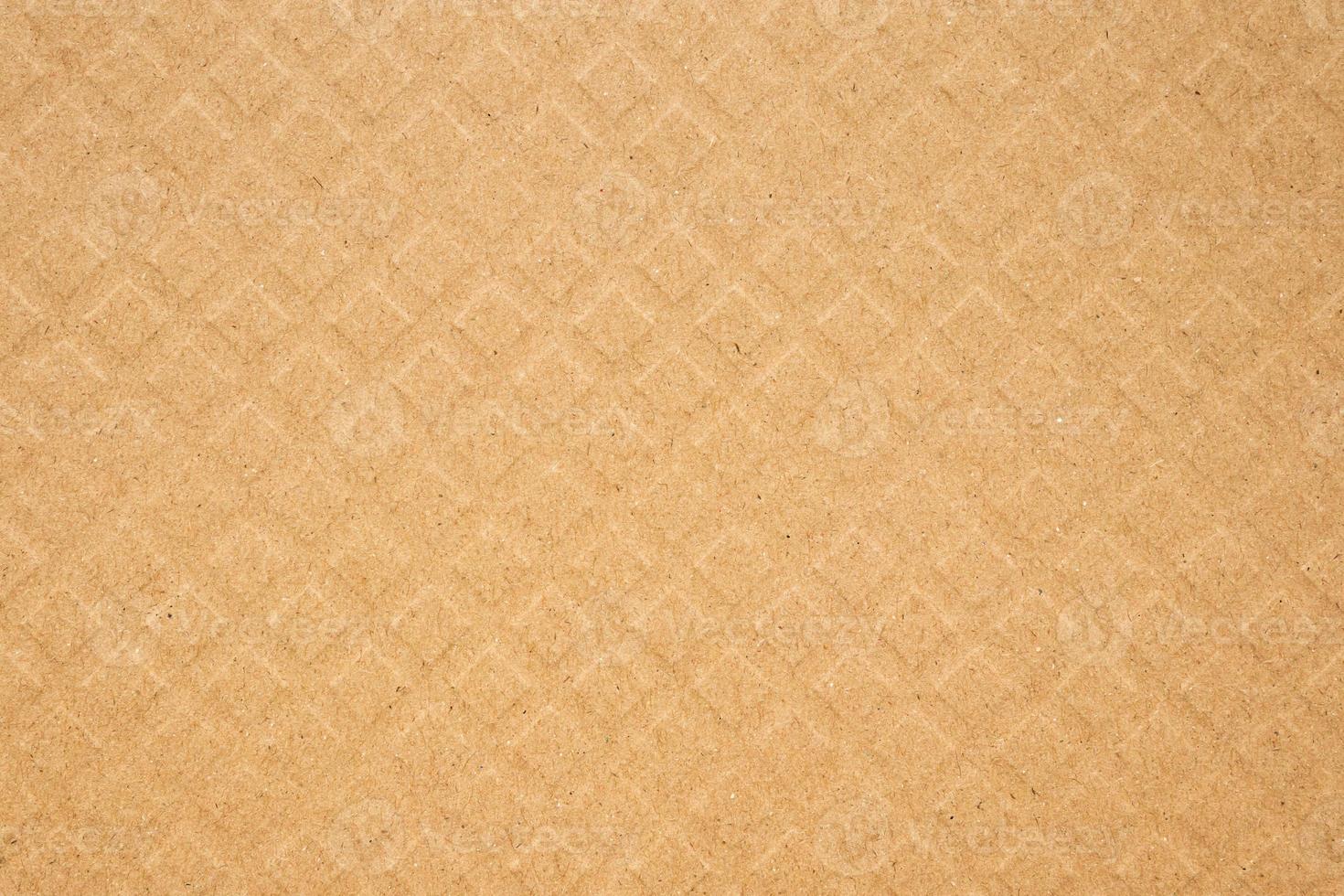 Brown square pattern recycle paper cardboard surface texture background photo