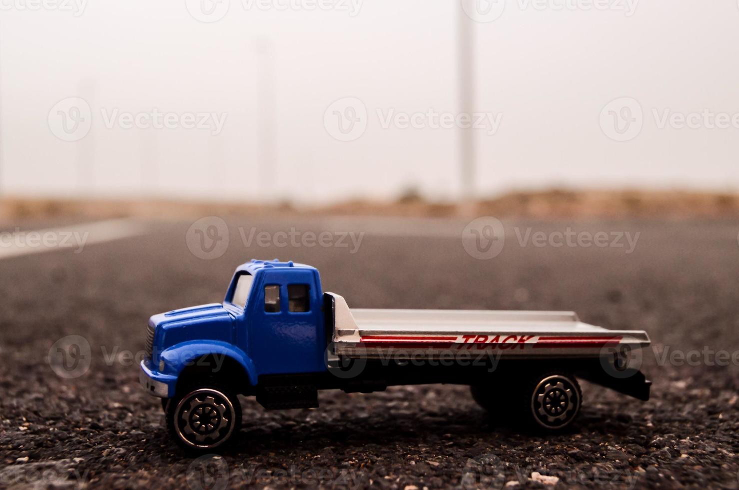 Miniature truck on the road photo