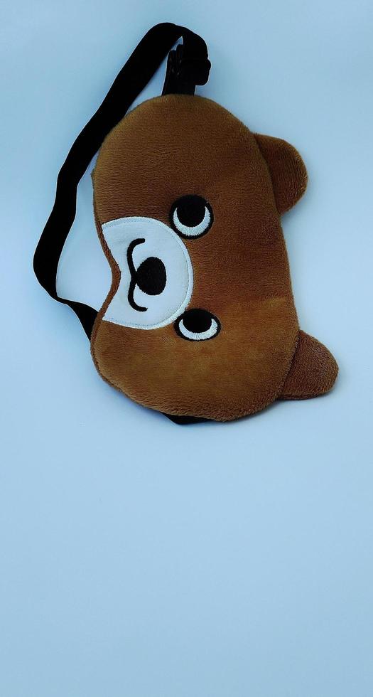 The blindfold mask portrait is used during sleep for relaxation and sleep more soundly. photo