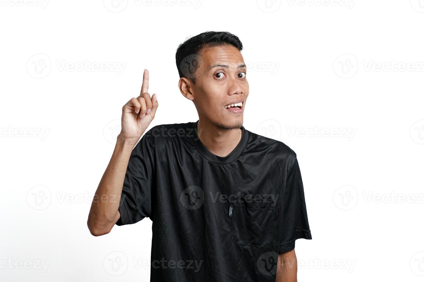 Asian man wearing black training t-shirt, Gesture thinking or getting idea. Isolated by white background photo
