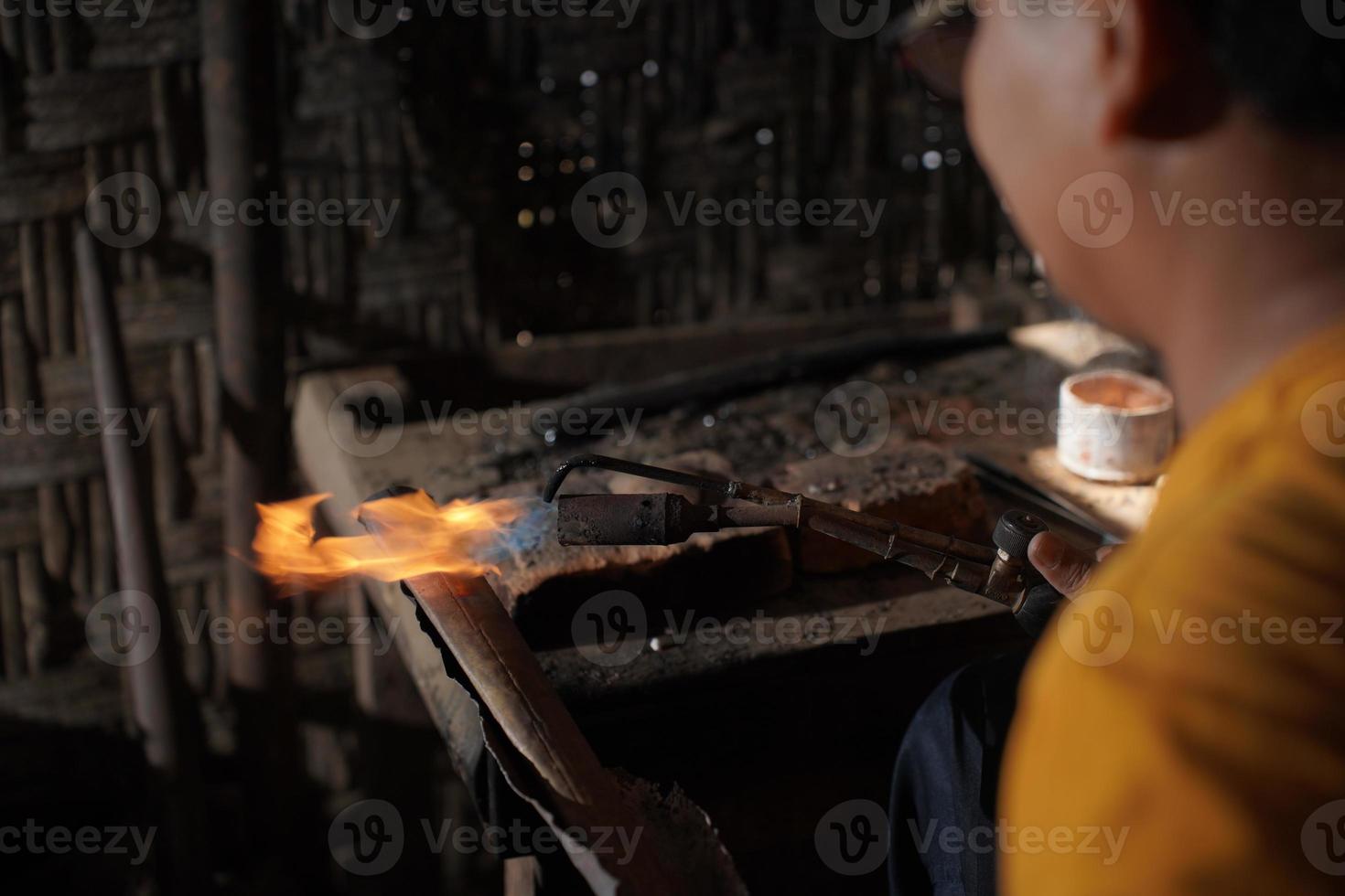 The process of making keris is done manually and traditionally photo