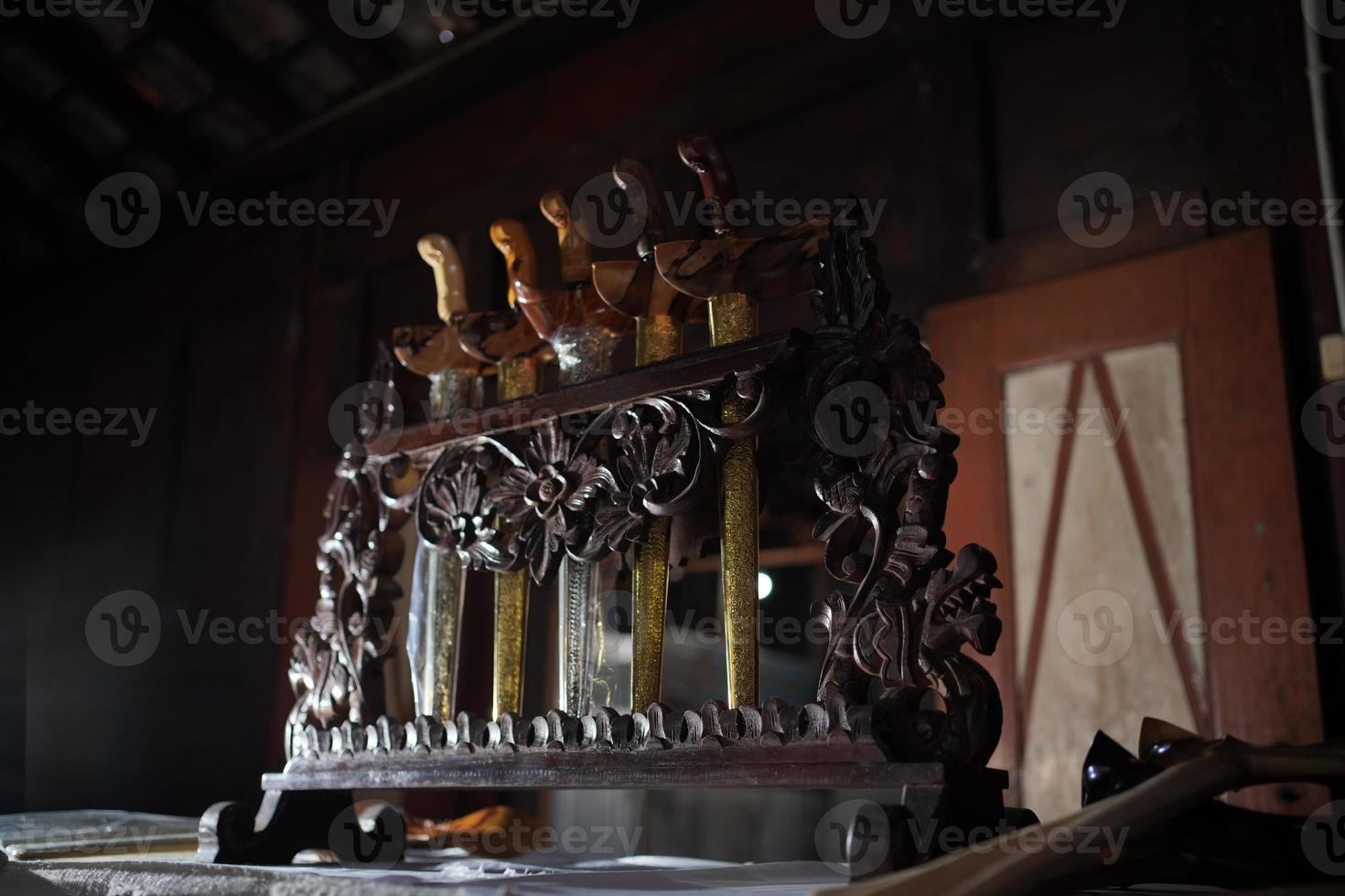 The Javanese keris that is being displayed is a traditional weapon photo