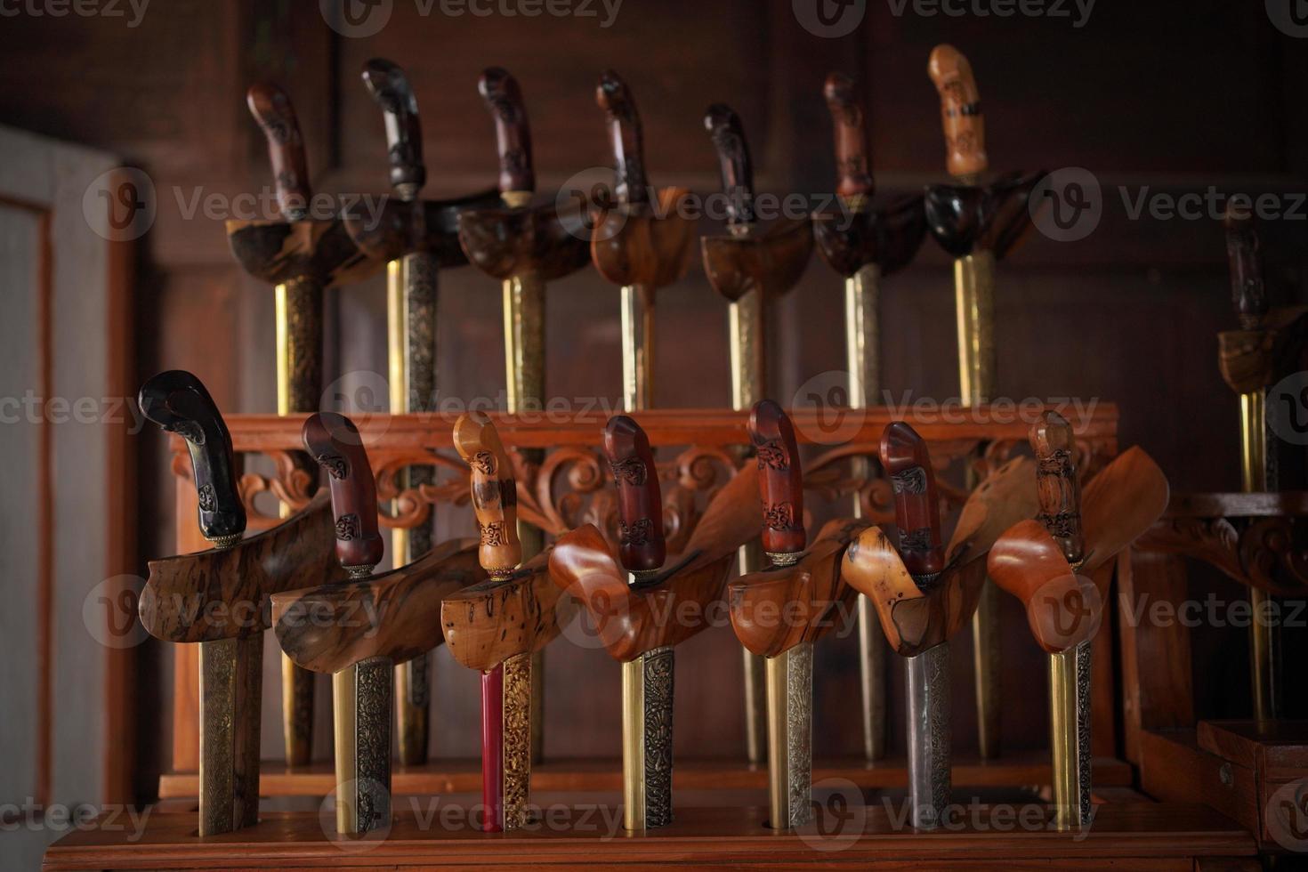 The Javanese keris that is being displayed is a traditional weapon photo