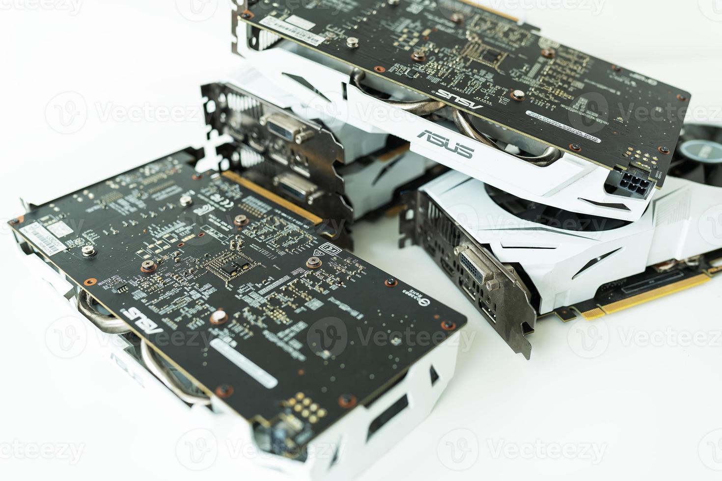 Computer graphic card with two fans. Video card with two coolers from the computer. GPU card. IT hardware. Crypto currency mining rig with graphics cards. Mining ethereum, bitcoin and altcoins. photo