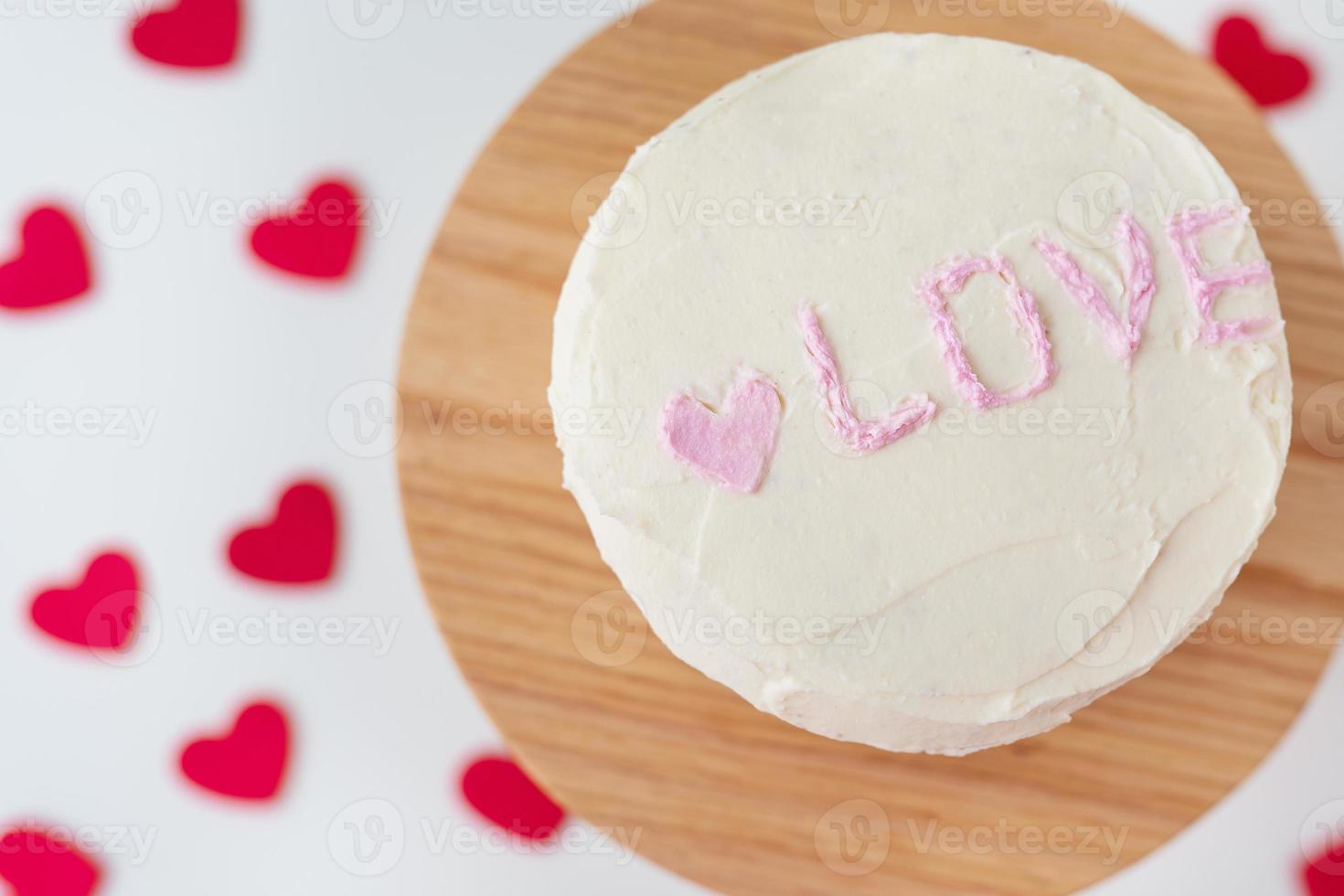 Bento cake with the inscription Love and hearts. A small Korean cake for one person. A cute dessert gift for a loved one for any holiday. Valentine's Day. photo