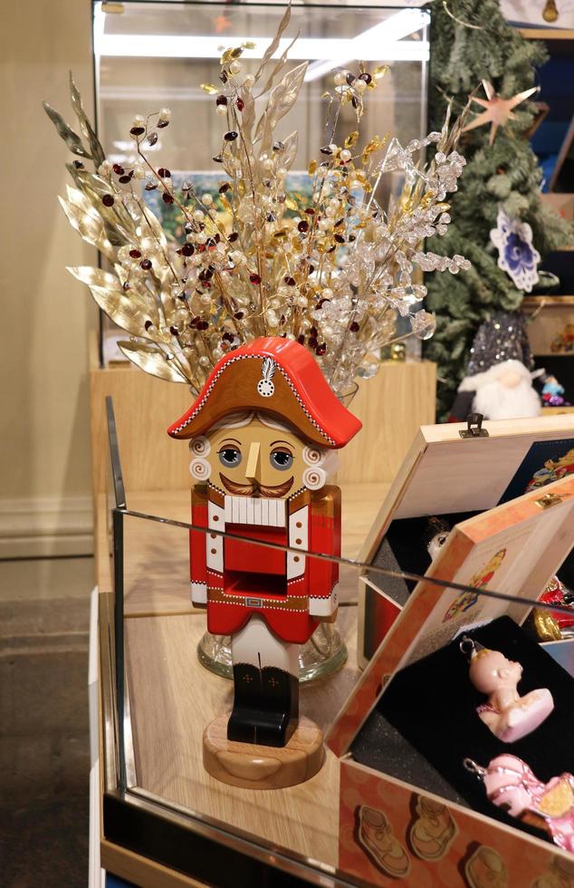 Moscow, Russia, 2022 - Nutcracker wooden toy in the main department store photo