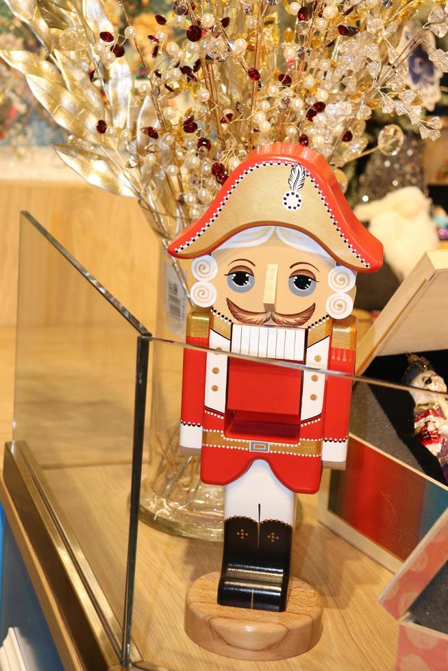 Moscow, Russia, 2022 - wooden souvenir toy the hero of the fairy tale The Nutcracker in the main department store photo